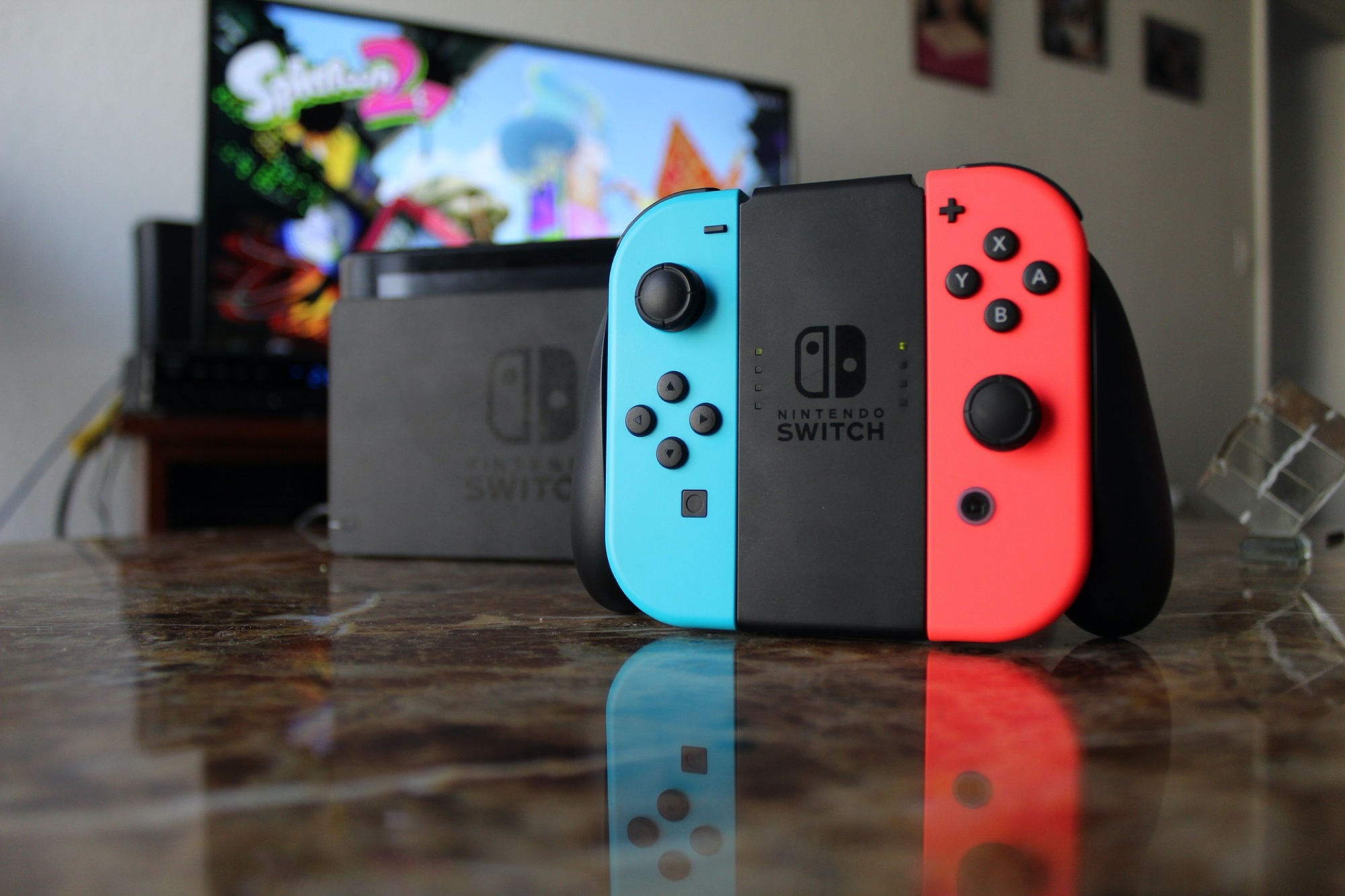 Nintendo Switch Joy Con Controllers in Grip - Pixabay