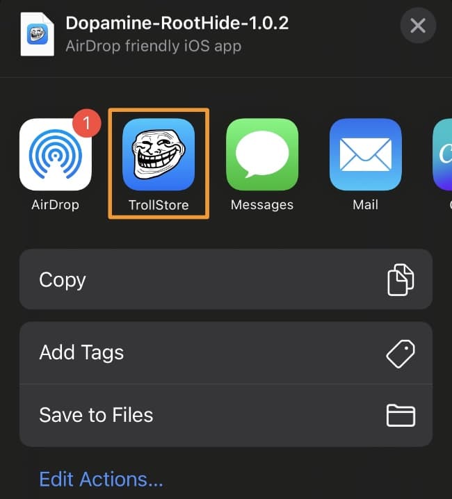 TrollStore in RootHide share sheet.